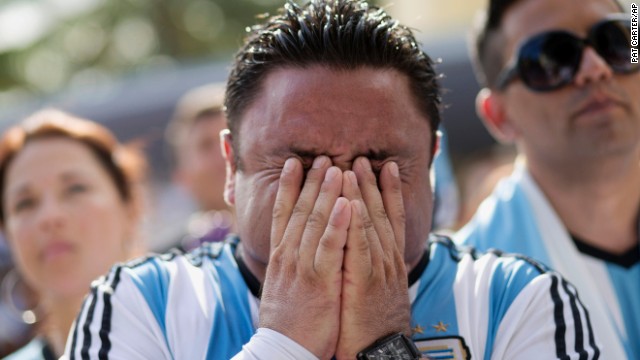 An Argentina fan in Miami Beach, Florida, reacts after his team lost the final.