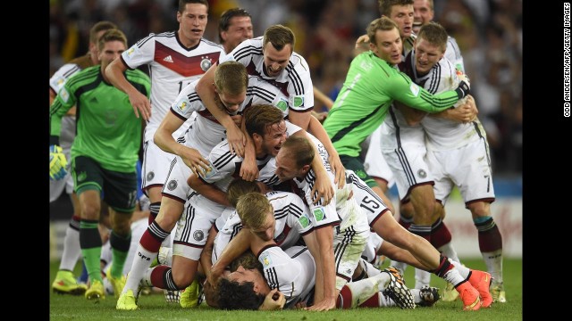 German players celebrate after the match.