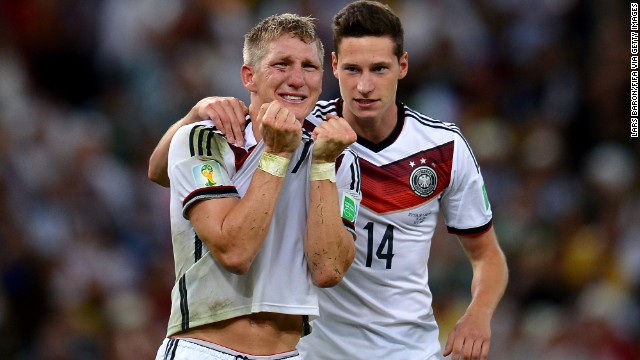 Schweinsteiger, left, and Julian Draxler react after the match.