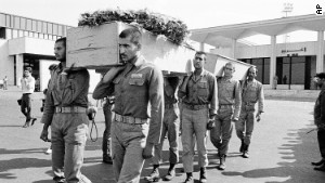 A funeral is held for six Pakistani and Indian nationals who were killed aboard Iran Air Flight 655 in July 1988.