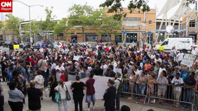 Garner's family, friends and people from the Staten Island community gathered in July 2014 to demand a full investigation into the incident.