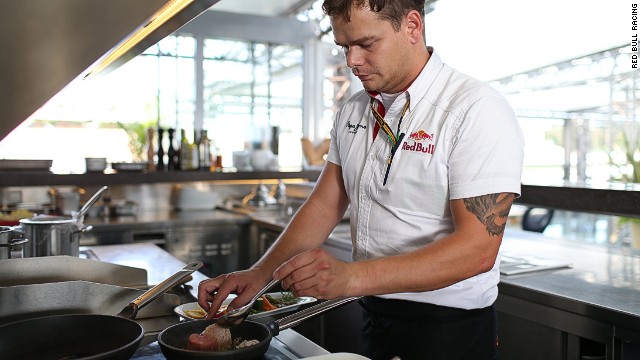 Red Bull Racing executive chef Sandro Gamsjager, seen here in the roof top kitchen of the team's motor home, says he cooks up to 2,500 meals for the team and guests over a grand prix weekend.