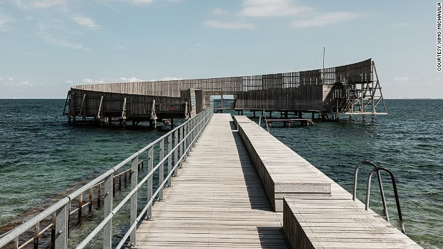 Kastrup Pier in Denmark has a structure at the end that encircles an outdoor swimming area.