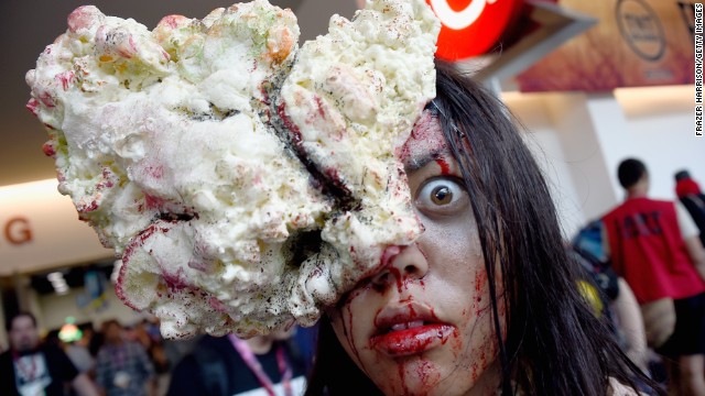 A gore-splattered attendee poses on July 26. 