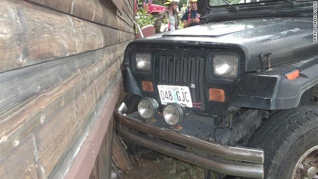 Police: Toddler Smashes Jeep into House, Dashes Home to Watch Cartoons