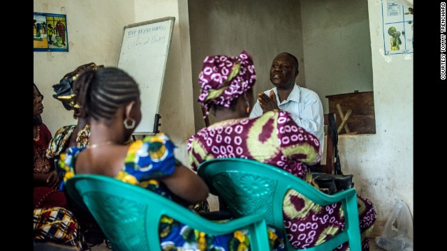 Dr. Mohamed Vandi of the Kenema Government Hospital trains community volunteers who will aim to educate people about Ebola in Sierra Leone.