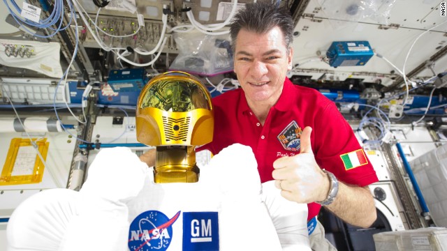 He's the only permanent resident of the International Space Station.<a href='http://robonaut.jsc.nasa.gov/ISS/' target='_blank'> Robonaut 2 or R2</a>, pictured here with ESA astronaut Paolo Nespoli, was designed by NASA and General Motors as a humanoid robotic assistant to perform maintenance tasks and free up the astronauts' time.