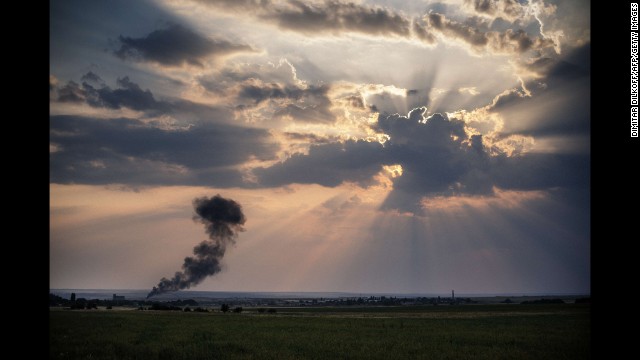 Smoke billows from a Ukrainian fighter jet crash near the village of Zhdanivka, Ukraine, on August 7. 