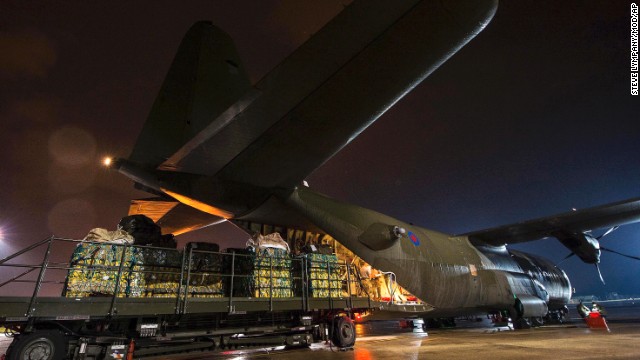 Humanitarian aid for Iraq is loaded onto an aircraft in Norton, England, on Friday, August 8. 