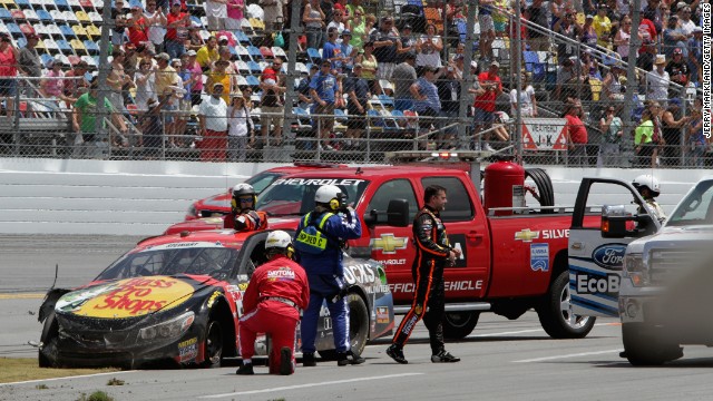 Stewart gets out of his car after an incident during the NASCAR Sprint Cup Series Coke Zero 400 at Daytona International Speedway on July 6 in Daytona Beach, Florida. 