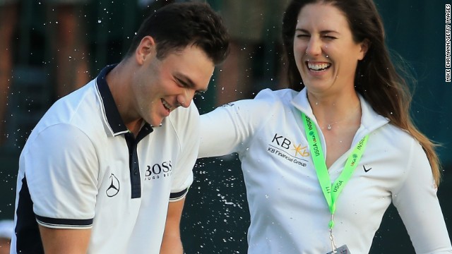 Kaymer is doused with water by fellow German and LPGA star Sandra Gal in June after adding to his 2011 PGA Championship triumph.
