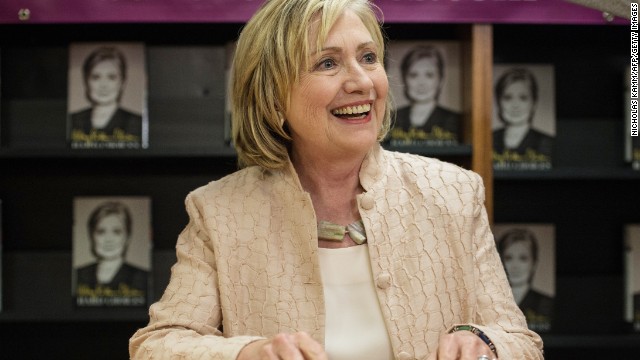 No word on hug, Clinton says all's good with Obama