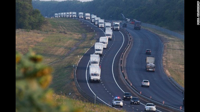 A convoy of trucks, which Moscow said was carrying relief goods for war-weary civilians, moves from Voronezh, Russia, toward Rostov-on-Don, Russia, on August 14.