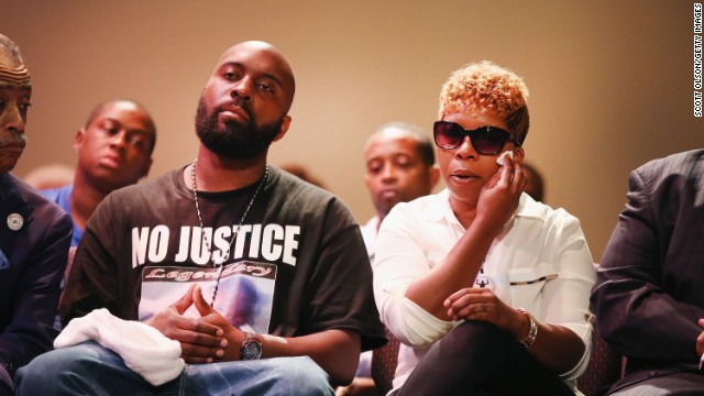 Michael Brown Sr. and Lesley McSpadden, the parents of Michael Brown, attend a rally at Greater Grace Church in Ferguson on August 17.