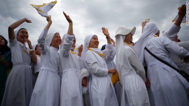 Nuns greet Pope Francis for a Mass in Haemi on Sunday, August 17.