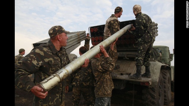 Ukrainian soldiers load a missile during fighting with pro-Russian rebels Monday, August 18, near Luhansk, Ukraine.