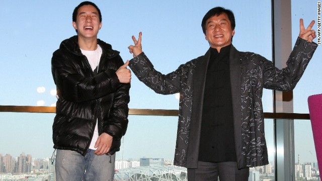 Jackie Chan (right) poses with his son Jaycee in 2009 outside Beijing's 