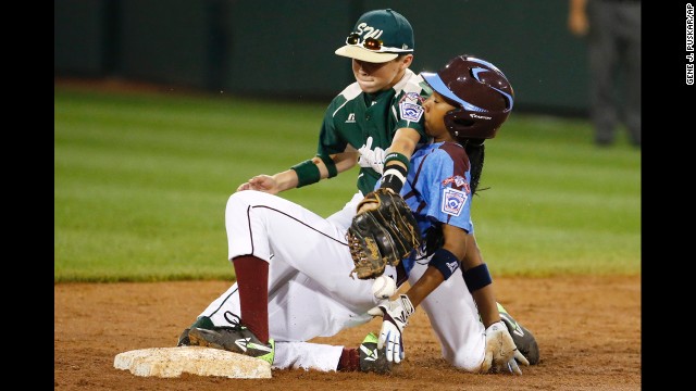 Davis is safe at second in the August 17 match against Pearland. An estimated 32,000-plus people showed up to watch Davis play in South Williamsport, Pennsylvania, after her shutout gained national attention.