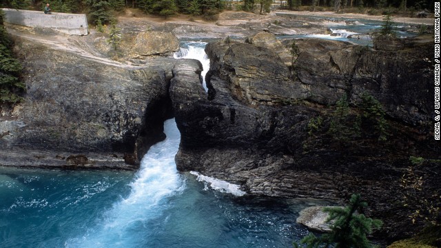 Head to Yoho National Park in the Canadian Rockies to watch Kicking Horse River still carving a path through this natural bridge. 