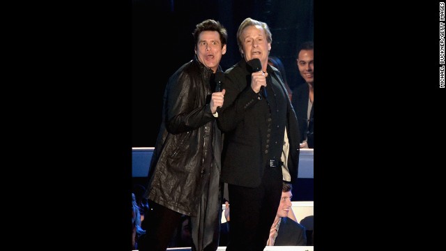 Jim Carrey, left, and Jeff Daniels get "Dumb and Dumber" on stage at the 2014 MTV Video Music Awards.
