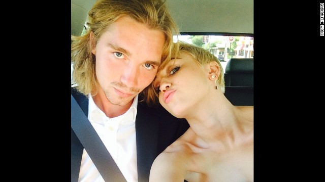 Miley Cyrus was excited about Jesse Helt escorting her to the 2014 MTV Video Music Awards. She posted their picture on social media with the caption "My date :) #jesse #myfriendsplace #mtvVMAs2014." 