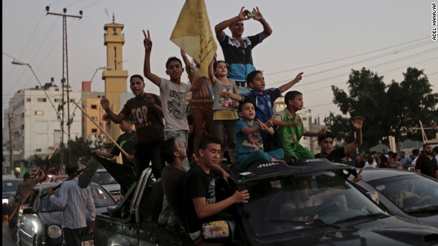 Palestinians in Gaza celebrate a ceasefire between Israel and Hamas on Tuesday, August 26. After more than seven weeks of heavy fighting, Israel and Hamas agreed to an open-ended ceasefire that puts off dealing with core long-term issues. 