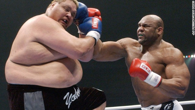 Fight flashback. In December 2003, former NFL player Bob Sapp (right) takes on Hawaiian-born former sumo wrestler Taro Akebono in a K-1 bout in Nagoya, Japan. Sapp won by technical knockout.