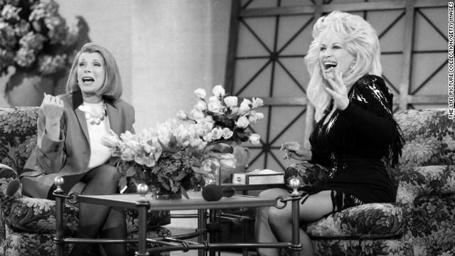 Rivers later hosted talk shows of her own. Here, she chats with Dolly Parton.
