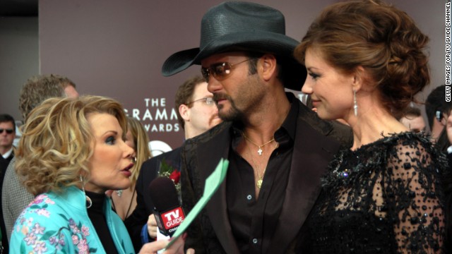 Rivers talks with Tim McGraw and wife Faith Hill at the Grammys in 2005.