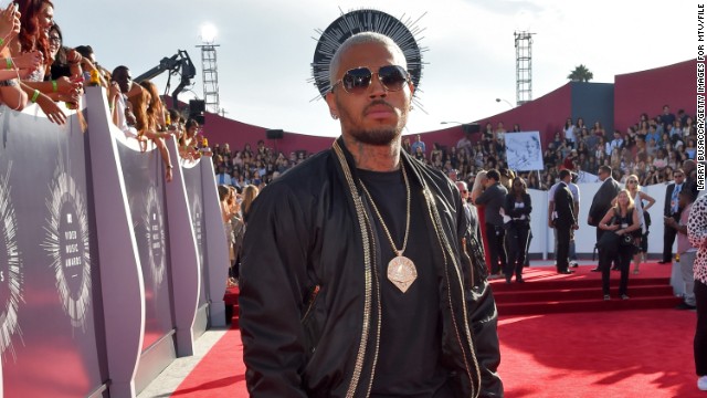 <strong>August 2014:</strong> Brown attends the 2014 MTV Video Music Awards. Earlier, three people, including former rap mogul Marion "Suge" Knight, <a href='http://www.cnn.com/2014/08/24/showbiz/chris-brown-party-shooting/'>were shot at a pre-awards party that Brown hosted. </a>