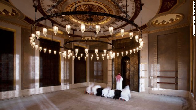 Worshipers pray inside the Golden Mosque. "I think when you step inside a mosque, like any other religious building, you leave everything to do with the outside world, outside the door," said Fadillioglu. "It should be a place of serenity."