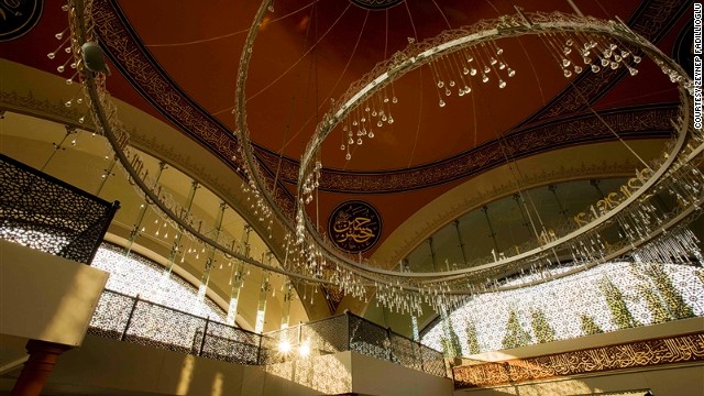 "Beneath the big dome you feel humility," said 59-year-old Fadillioglu. "At the same time, the beautiful chandeliers are much lower than normal, allowing people to feel more secure having this low light above their heads."