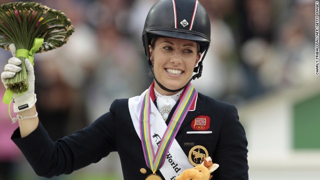 British rider Charlotte Dujardin continued her reign as the golden girl of dressage, winning both individual titles at the World Equestrian Games in France.