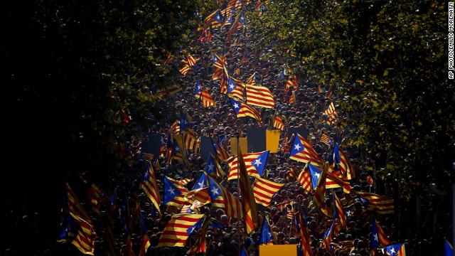 SEPTEMBER 11 - BARCELONA, SPAIN: People wave Catalan 