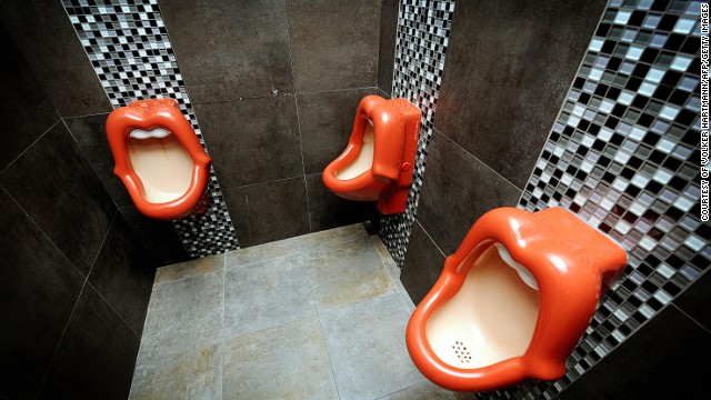 Urinals in the toilets at the 'Rosenmeer' restaurant in the western German city of Moenchengladbach are pictured. The urinals in the shape of a mouth, created by Dutch designer Meike van Schijndel, were criticized for being offensive to women. 