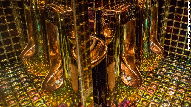 Gold colored urinals are seen in the men's bathroom at The Robot Restaurant in Tokyo, Japan. The now famous Robot Restaurant opened two years ago in Kabukicho area of Shinjuku at an estimated cost of 10 million U.S. dollars. 