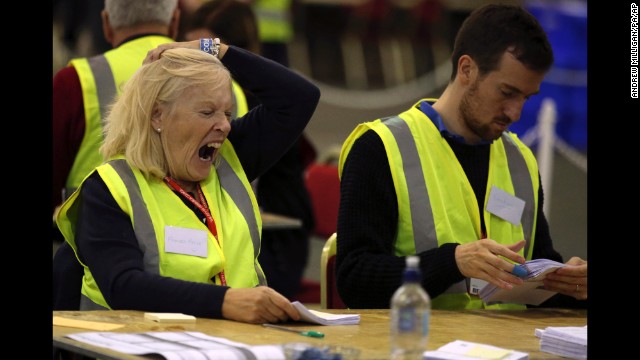 Ballot counting was tiring for staffers working through the night at the Royal Highland Centre in Edinburgh.