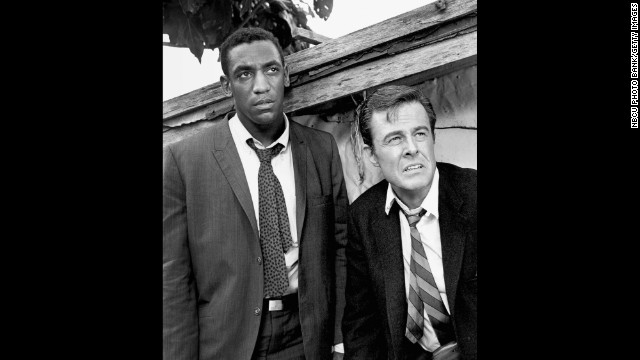 Cosby won three Emmys for his portrayal of Alexander Scott, an Oxford-educated spy who travels undercover as a trainer with his tennis-playing partner, Kelly Robinson (Robert Culp) in "I Spy," which aired on NBC from 1965 to 1968. Cosby was the first African-American to star in an American dramatic series.
