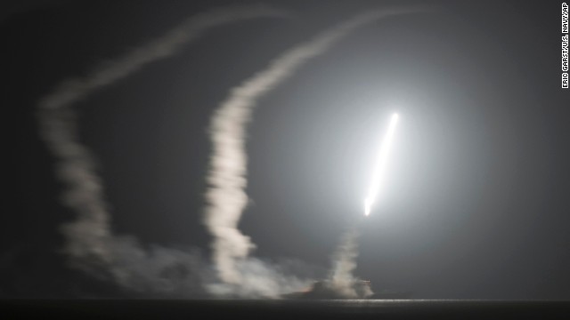 The USS Philippine Sea, a guided-missile cruiser with the U.S. Navy, launches a Tomahawk cruise missile from the Persian Gulf during an attack on ISIS positions on September 23. The U.S. Navy released this photo and several others following the airstrikes.
