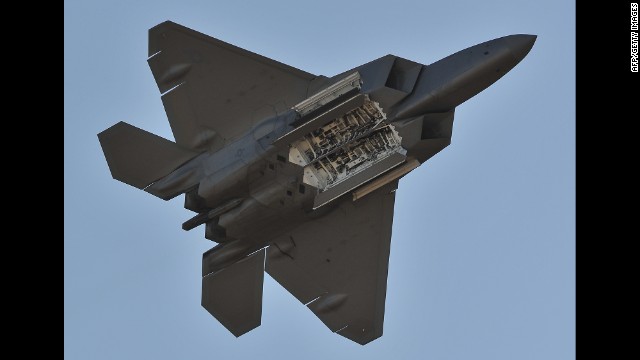 U.S. Air Force F-22 Raptors saw their first combat during strikes on ISIS targets in Syria, the Pentagon said. The single-seat, twin-engine stealth fighter has a top speed of almost 1,500 mph. Here, a Raptor performs during the Australian International Airshow in March 2013.