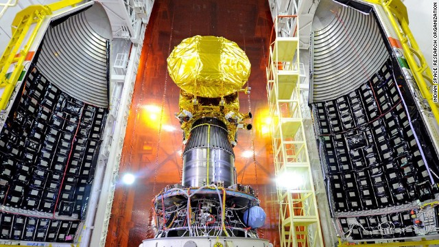 The Mars Orbiter spacecraft is pictured attached to the PSLV-C25 launch vehicle, with the heat shield open.