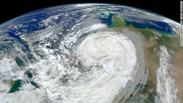 <strong>Extreme weather: </strong>The planet could see as many as 20 more hurricanes and tropical storms each year by the end of the century because of climate change, according to <a href='http://www.pnas.org/content/110/41/16361.full.pdf+html' target='_blank'>a 2013 study</a> published in the Proceedings of the National Academy of Sciences. This image shows Superstorm Sandy bearing down on the New Jersey coast in 2012.