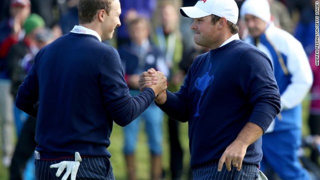 Poulter and partner Stephen Gallacher were unable to contain the U.S. pairing of Jordan Spieth (left) and Patrick Reed who ran out comfortable 5&amp;4 winners, giving Team USA their first point. 