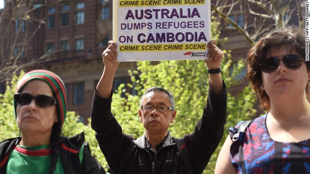 A protester in Sydney demonstrates against the controversial plan to resettle refugees in Cambodia.
