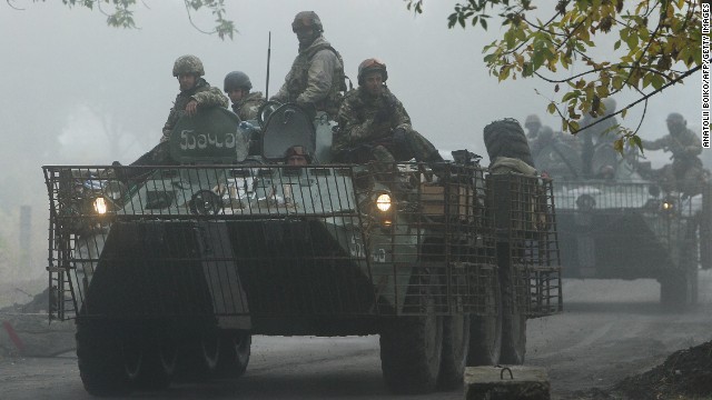 Ukrainian servicemen patrol in the Donetsk region on Friday, September 26.