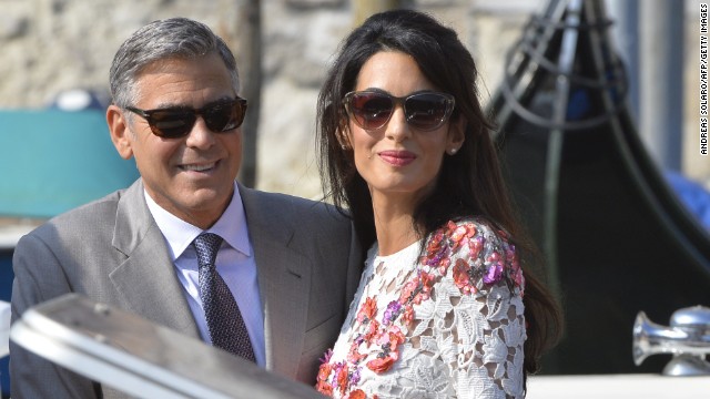 Actor George Clooney and his wife, attorney Amal Alamuddin, stand on a taxi boat on the Grand Canal in Venice, Italy, on Sunday, September 28. Clooney and Alamuddin <a href='http://www.cnn.com/2014/09/29/showbiz/italy-george-clooney-wedding/index.html'>married in Venice</a> the previous day at a private ceremony attended by celebrities. 