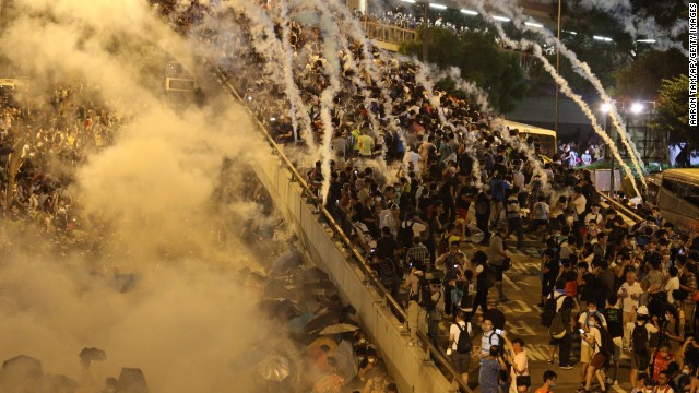 The Hong Kong Federation of Students issued a list of demands Sunday, vowing to escalate their actions if they were not met. Clashes between pro-democracy students and police continued in the financial district September 28.