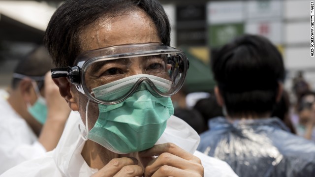 Pro-democracy activist and former legislator Martin Lee wears goggles and a mask to protect against pepper spray on September 28.