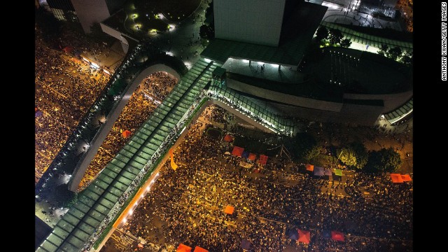 Protesters take part in a rally on a street outside the Hong Kong Government Complex on September 30.