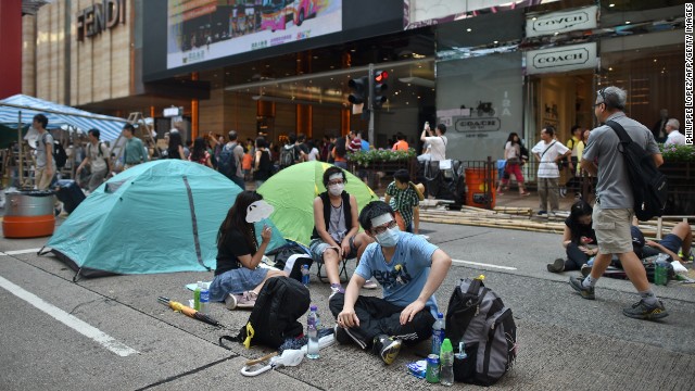 Protesters camp out in a street in Hong Kong on Wednesday, October 1. 